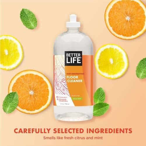 Better Life floor cleaner bottle surrounded by citrus and mint.