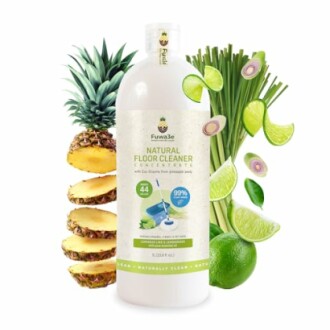 Natural floor cleaner concentrate bottle with pineapple and lime ingredients